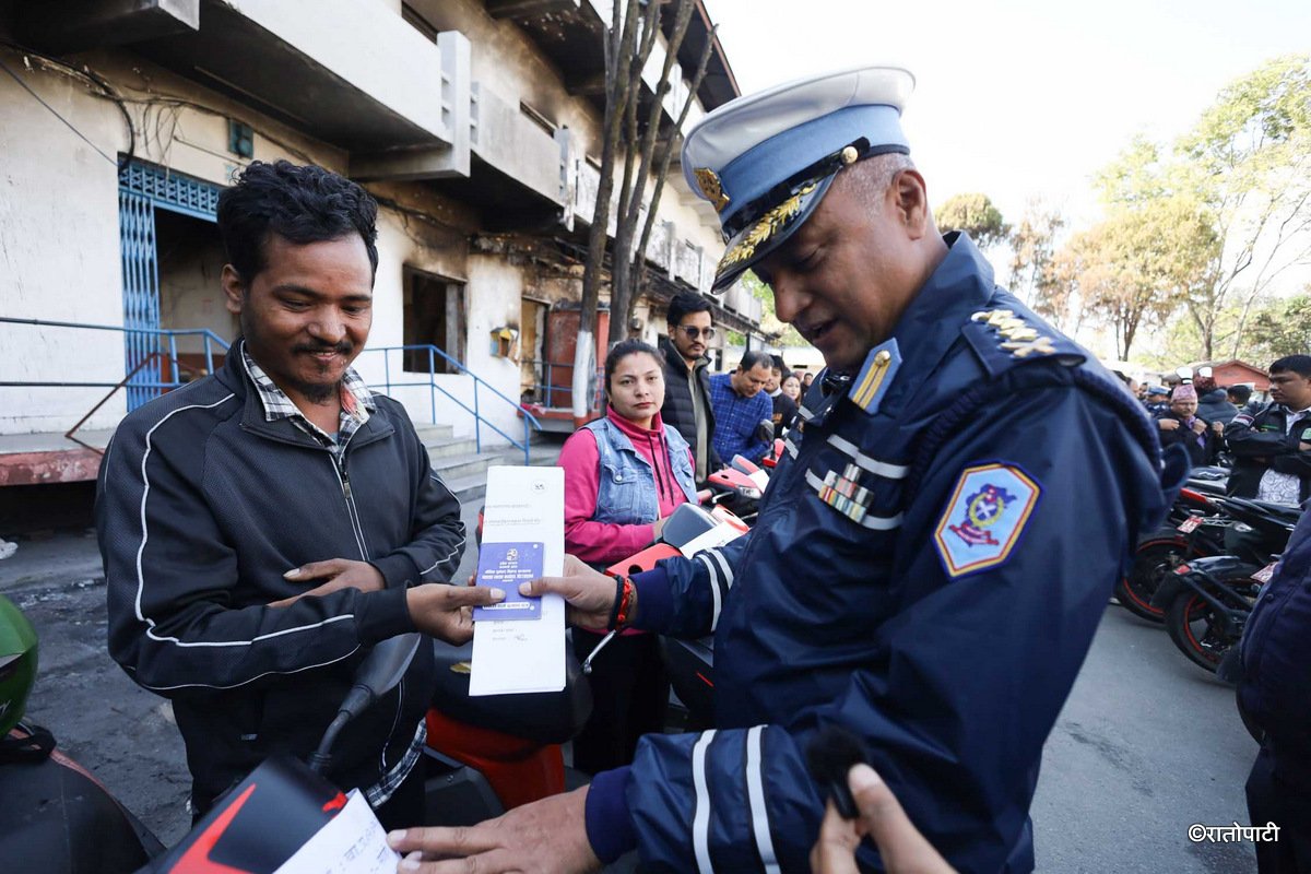 05-Bike handover _Traffic_ Nepal Photo Library5
