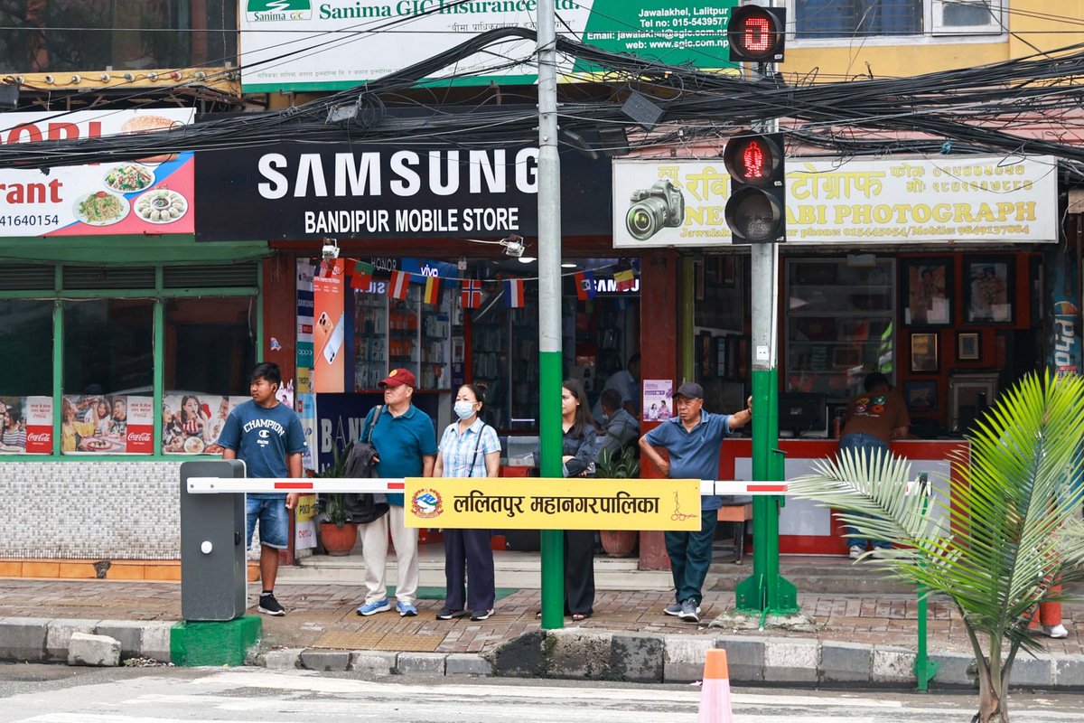 08-Lalitpur road cross safety barrier_Nepal Photo Library4