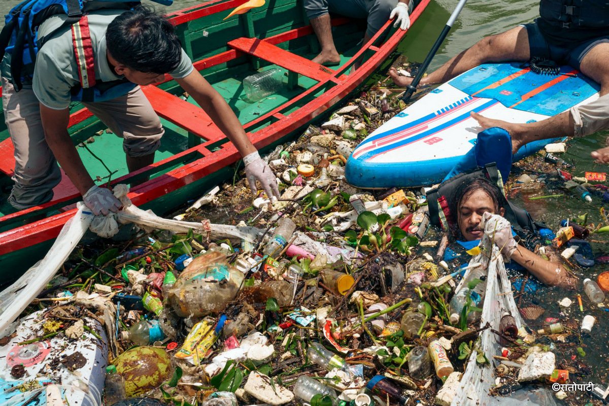 12-Phewa lake waste Managed_Nepal photo library12