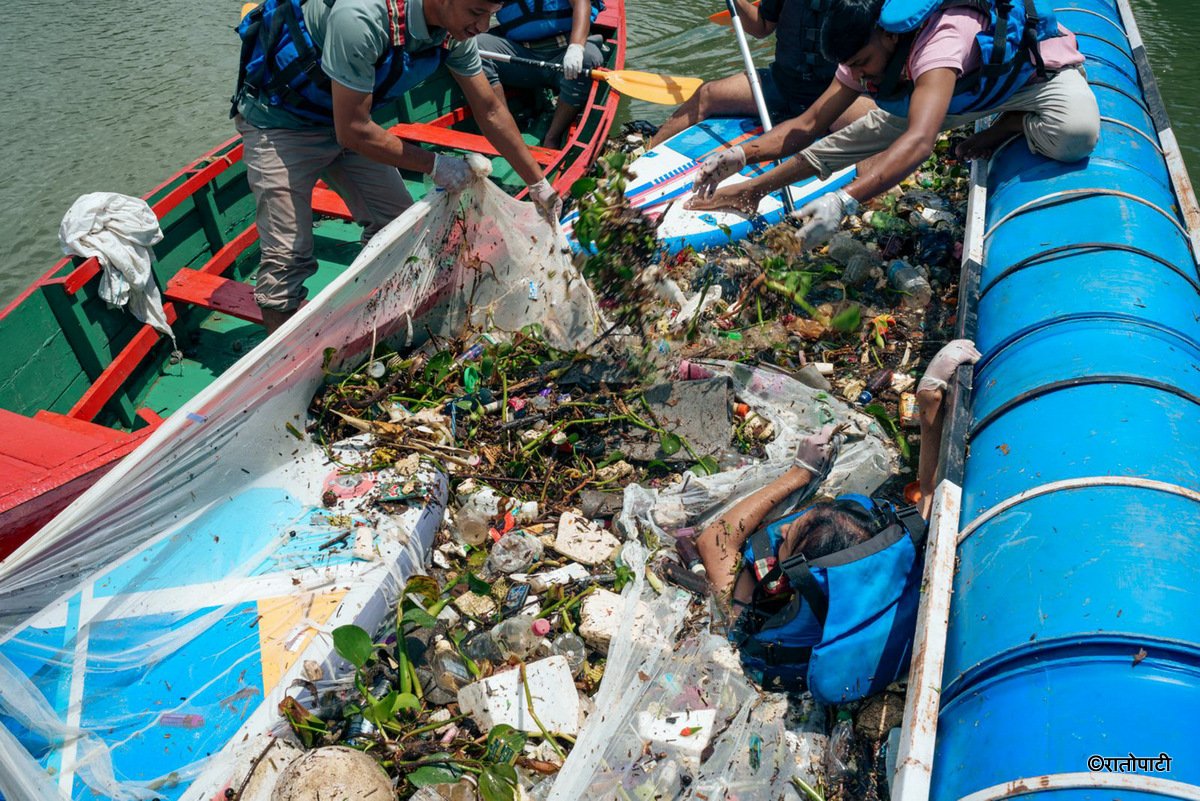 13-Phewa lake waste Managed_Nepal photo library13