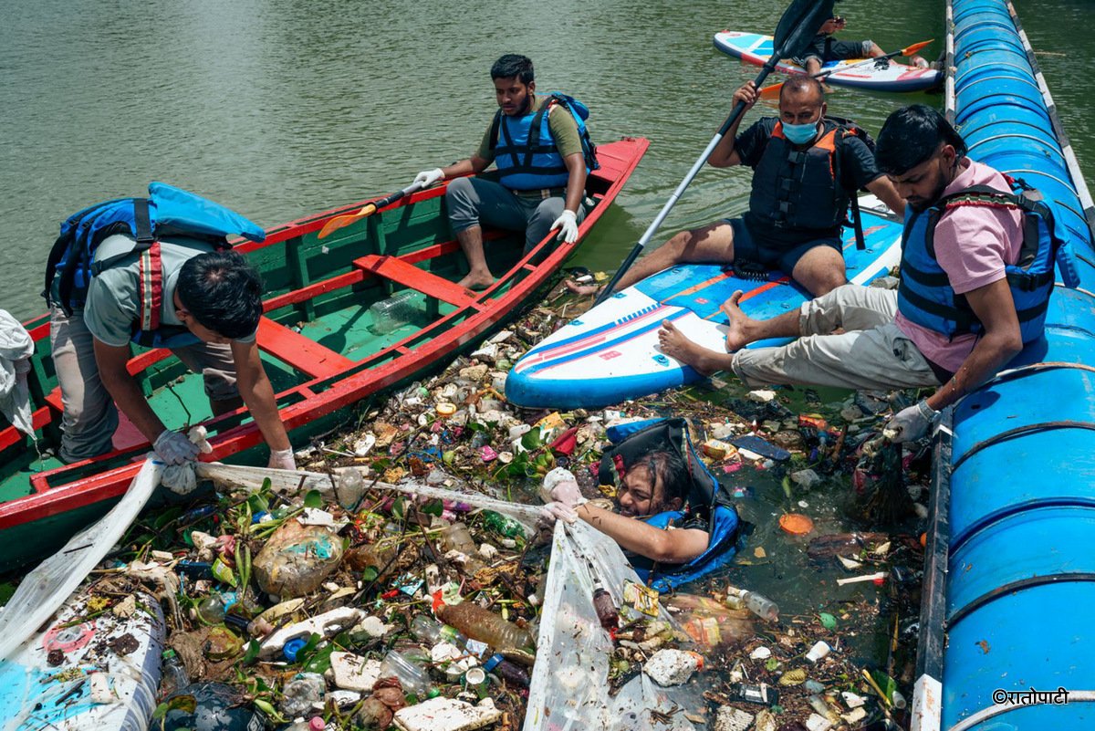 14-Phewa lake waste Managed_Nepal photo library14
