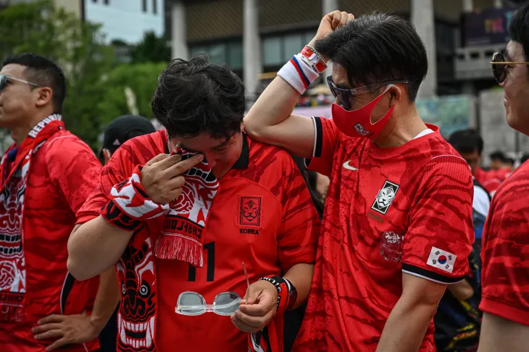 AFP__20260625__B8948G4__v1__HighRes__SkoreaFblWc2026Fans-1782713618