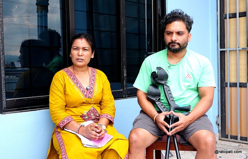 Bibek Bhandari with his wife_Spinal Cord