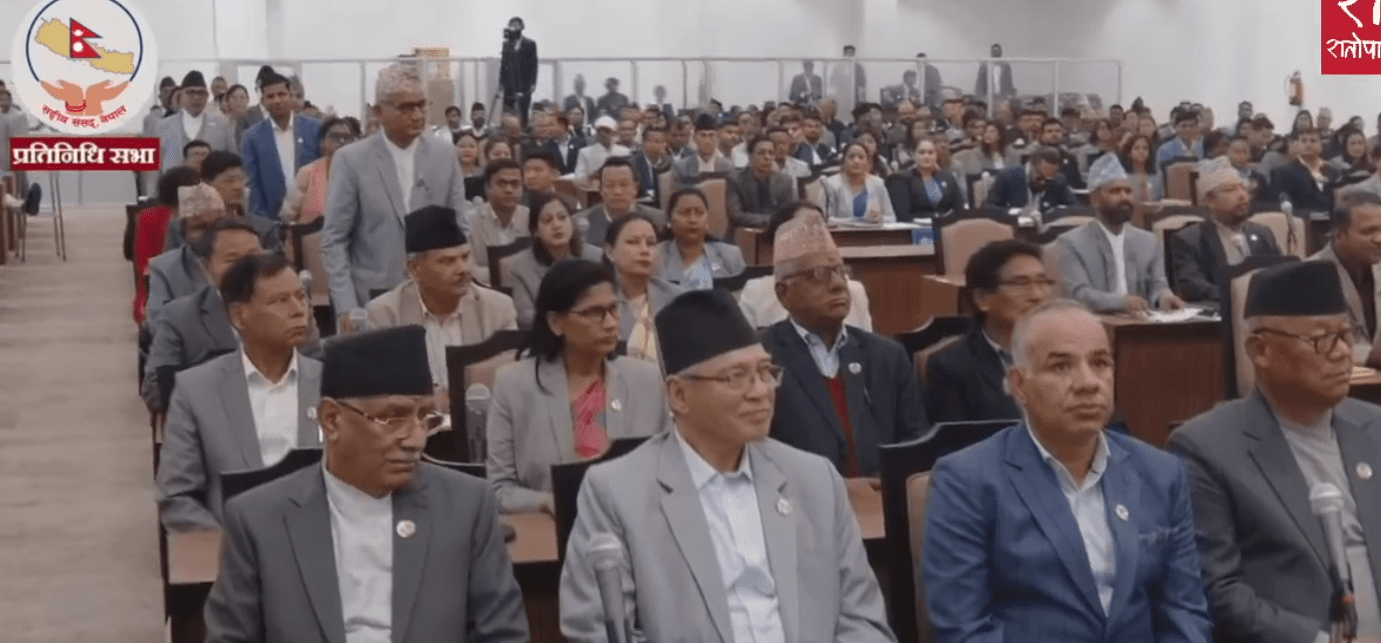 Lawmakers seated together in House of Representatives session