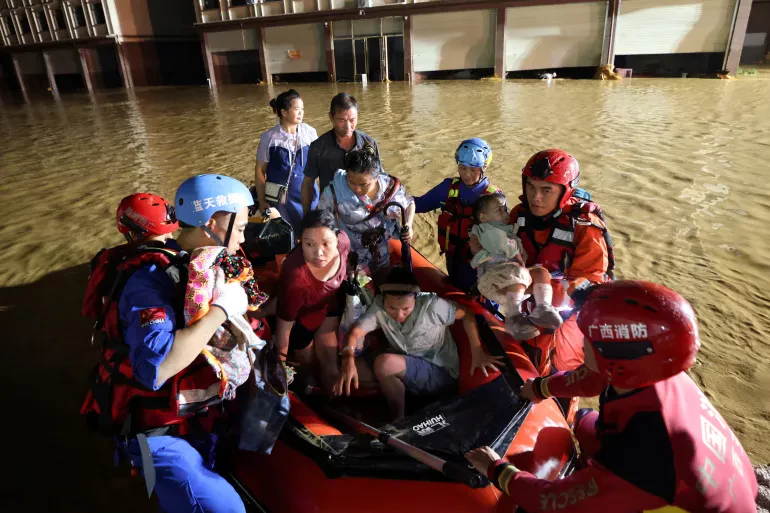 Landslide in China Buries 16 People; Typhoon Bavi Approaches