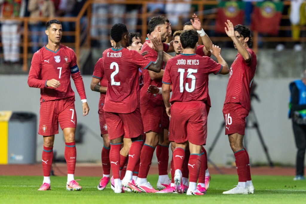 Protugal-national-team-players-celebrating-a-goal-against-Chile-1024x683